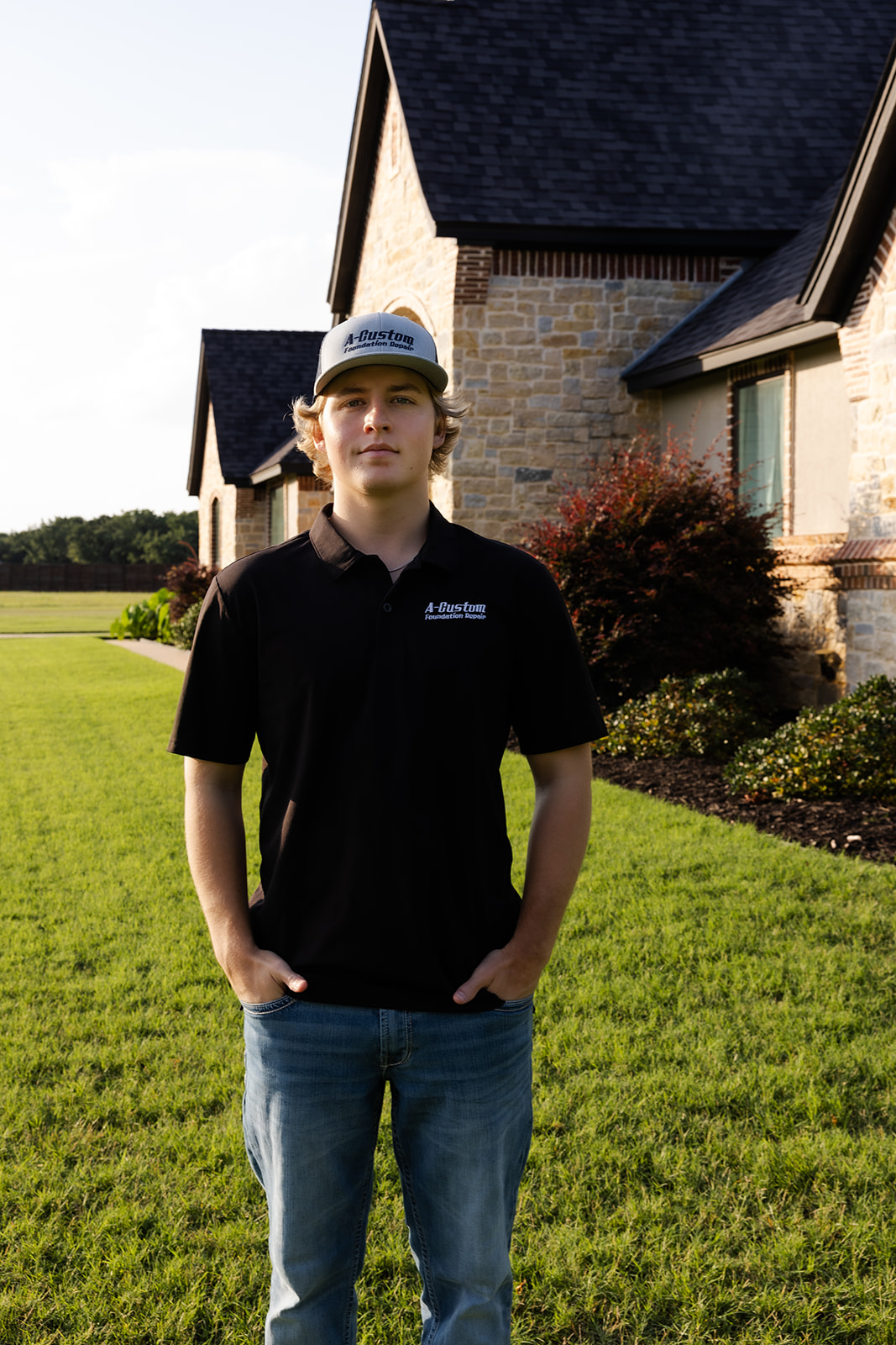 young man standing outdoors
